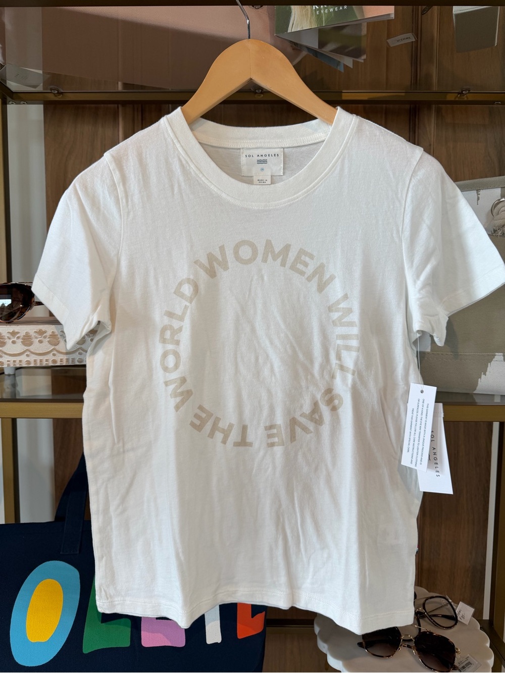 Sol Angeles White Tee with Beige Circular 'Women Will Save The World' Graphic
